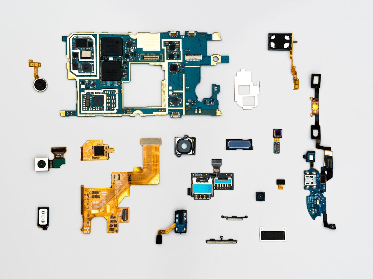 Home Exploded view of smartphone components showcasing intricate technological design.